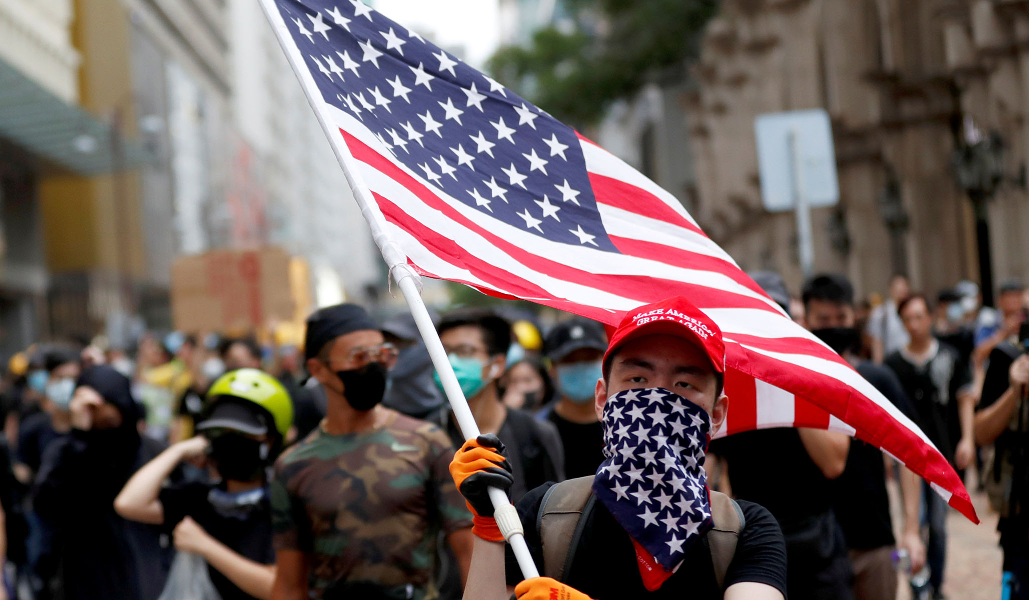Hong Kong & United States -- Protesters Wave the American Flag, but Is
