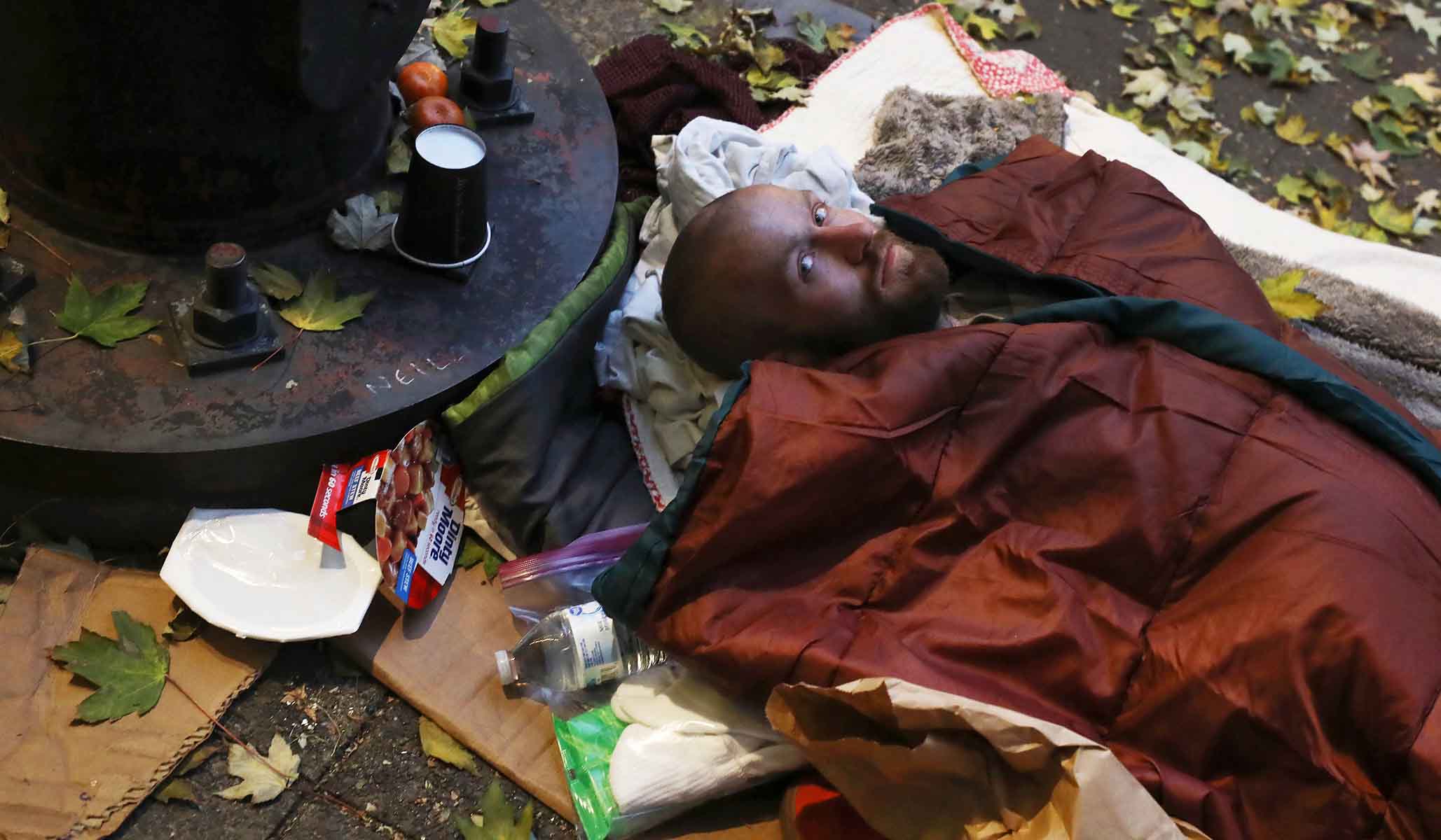 NextImg:Portland Activists Disrupt City Council Meetings, Scuffle with Security Guard over Homeless Tent Ban