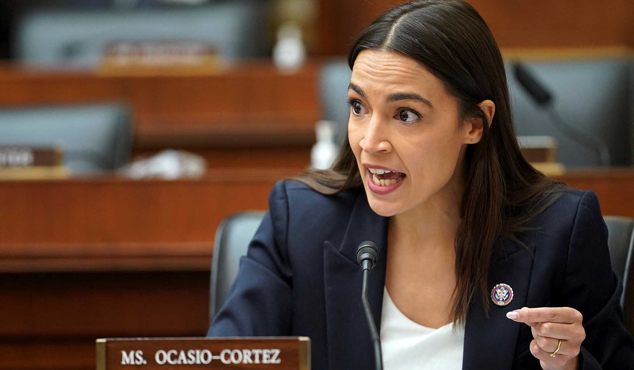 NextImg:‘American Citizens before Migrants’: Protesters Heckle AOC at NYC Town Hall 
